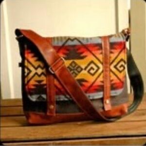 one of a kind messenger bag 
navajo print 

purchased from a friend on Etsy.